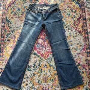 Most beautiful pair of mid rise flared dark wash y2k jeans